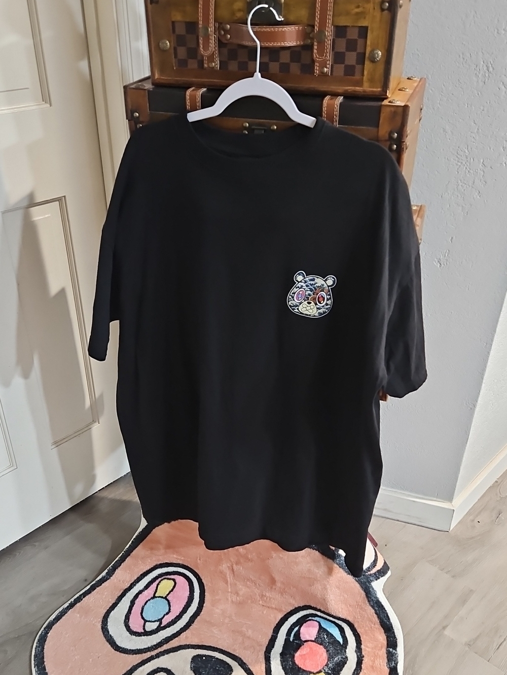 Unisex Black Graphic Tee with Colorful Bear Patch